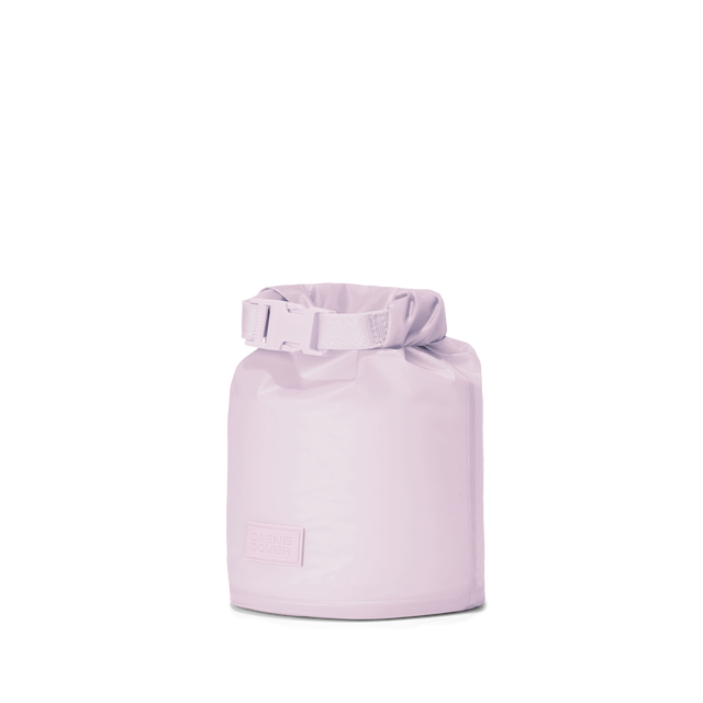 Dagne Dover Rae Roll-Top Dry Bag in a soft purple with grey undertones seen from an angle.