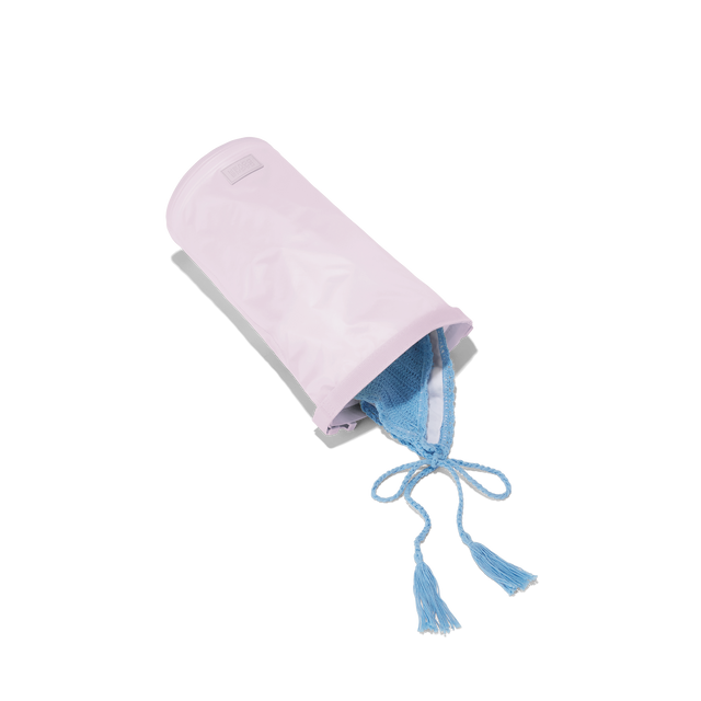 hover - Dagne Dover Rae Roll-Top Dry Bag in a soft purple with grey undertones on its side, unrolled, revealing the wipeable interior.
