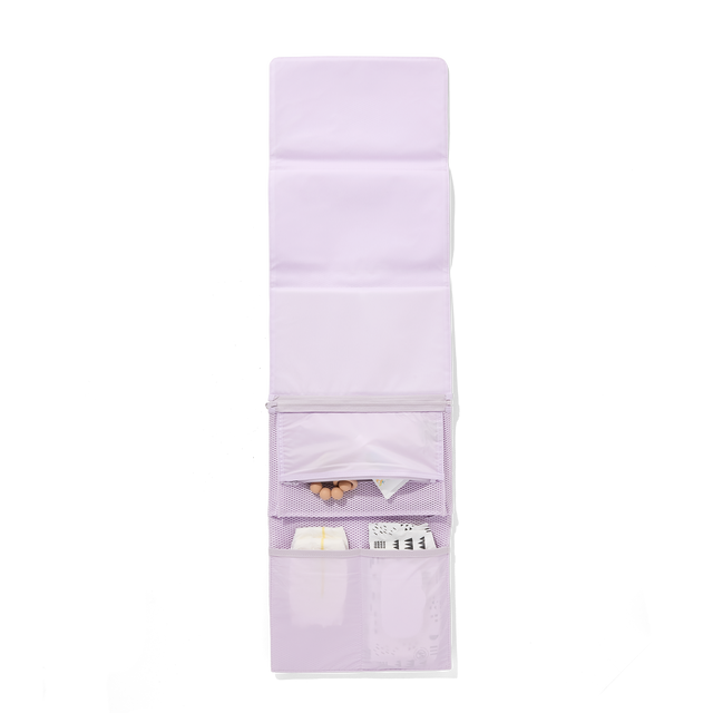 Dagne Dover Joey Changing Kit in a soft purple with grey undertones unfolded, revealing the detachable changing mat.
