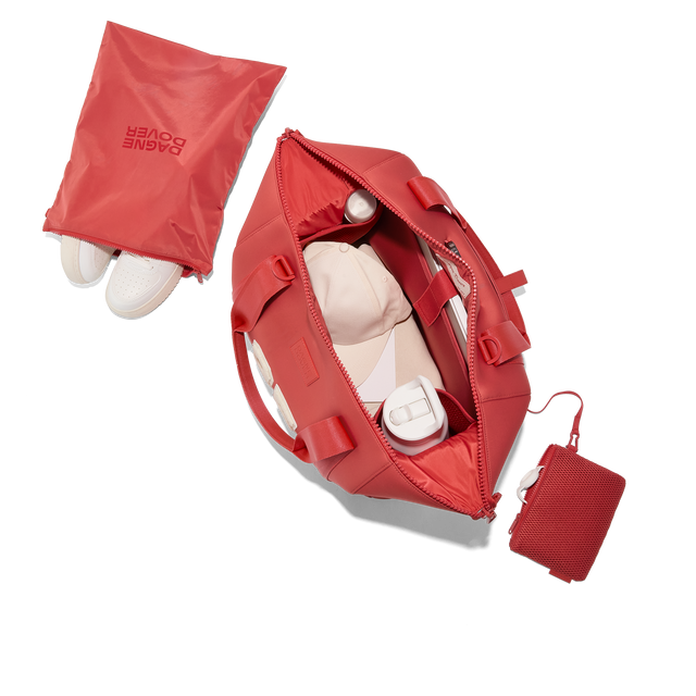Dagne Dover large Landon Carryall in a poppy, vintage wash red, unzipped, top down view. Hover
