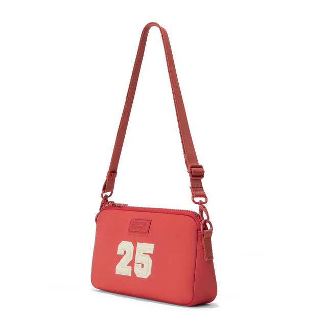 Dagne Dover Nora Shoulder Bag in a poppy, vintage wash red, side angle