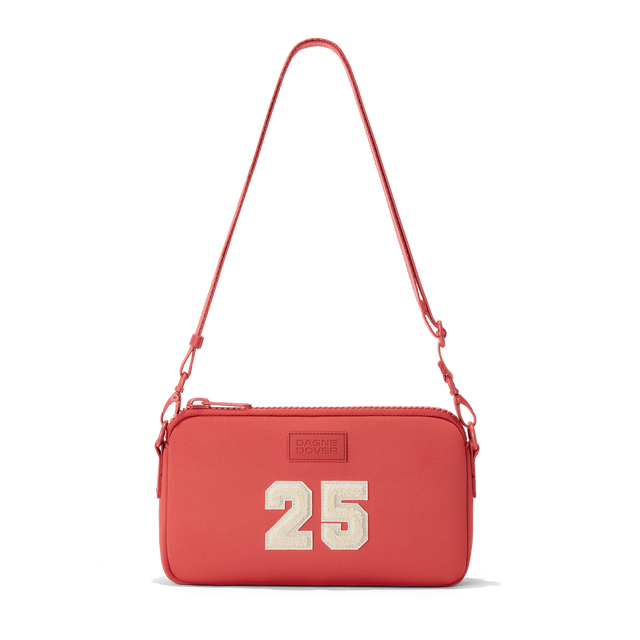 Dagne Dover Nora Shoulder Bag in a poppy, vintage wash red, strap up.