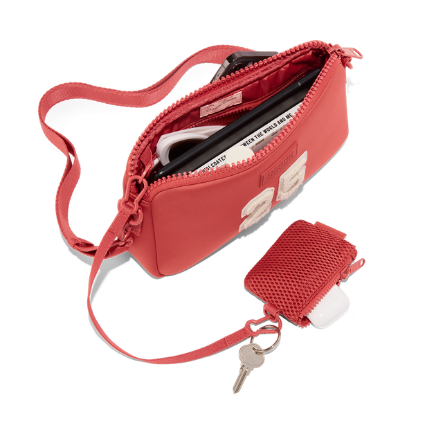 Dagne Dover Nora Shoulder Bag in a poppy, vintage wash red, unzipped topdown. hover