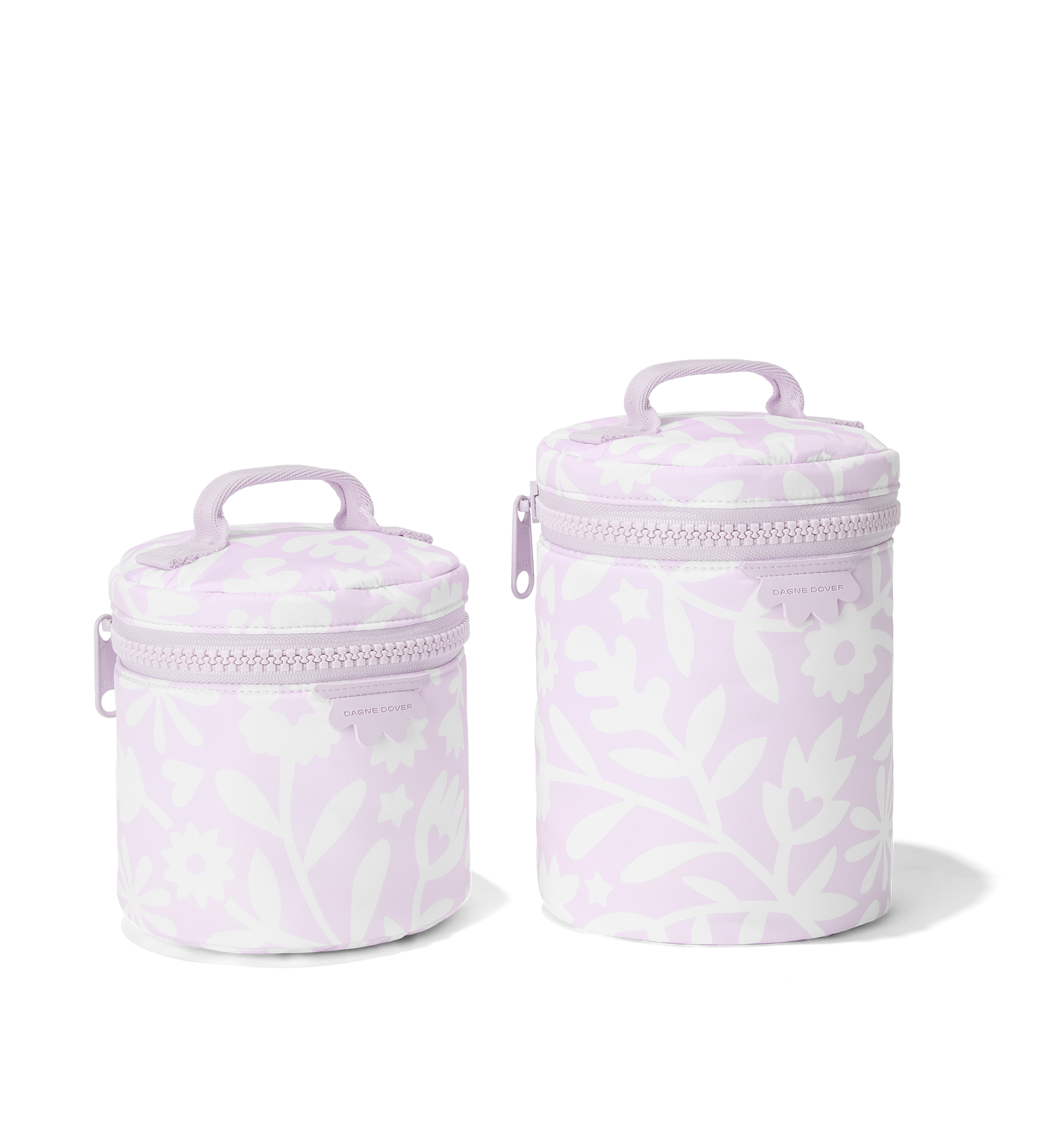 Dagne Dover small and large Mila Toiletry Pouches in a custom washed lilac and cream floral print.
