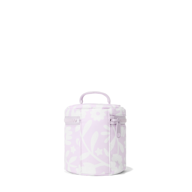 Dagne Dover small Mila Toiletry Pouch in a custom washed lilac and cream floral print seen from the back.
