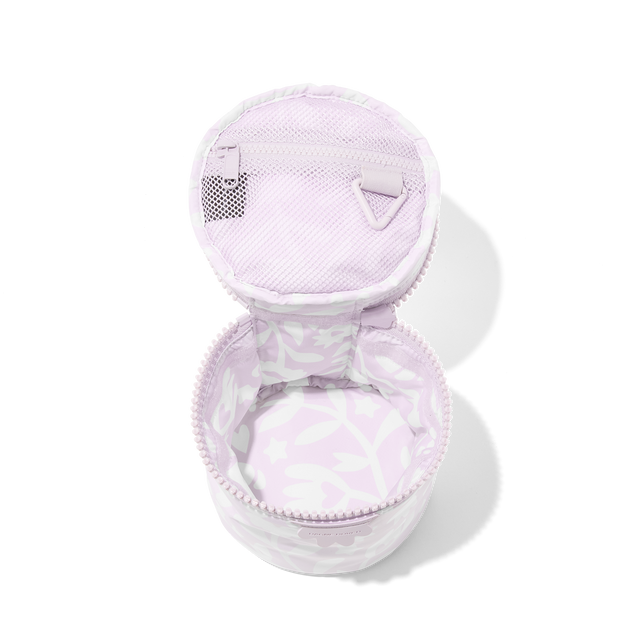 Dagne Dover small Mila Toiletry Pouch in a custom washed lilac and cream floral print unzipped.

