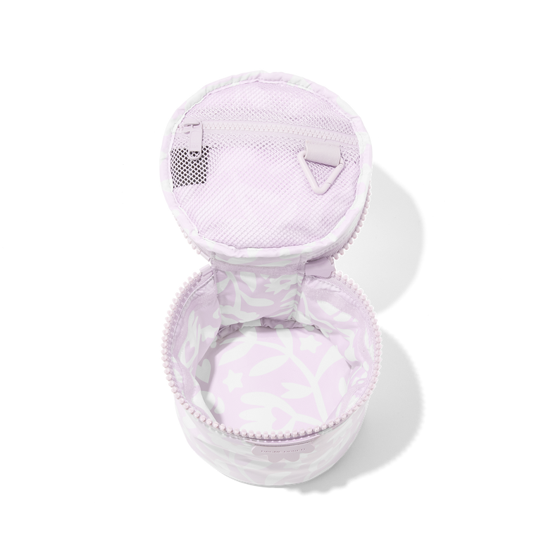 Dagne Dover small Mila Toiletry Pouch in a custom washed lilac and cream floral print unzipped.
