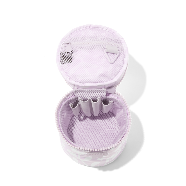 Dagne Dover small Mila Toiletry Pouch in a custom washed lilac and cream floral print unzipped with the removable airmesh insert.
