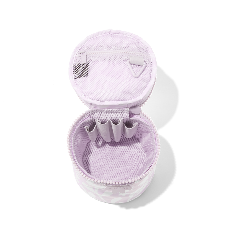 Dagne Dover small Mila Toiletry Pouch in a custom washed lilac and cream floral print unzipped with the removable airmesh insert.
