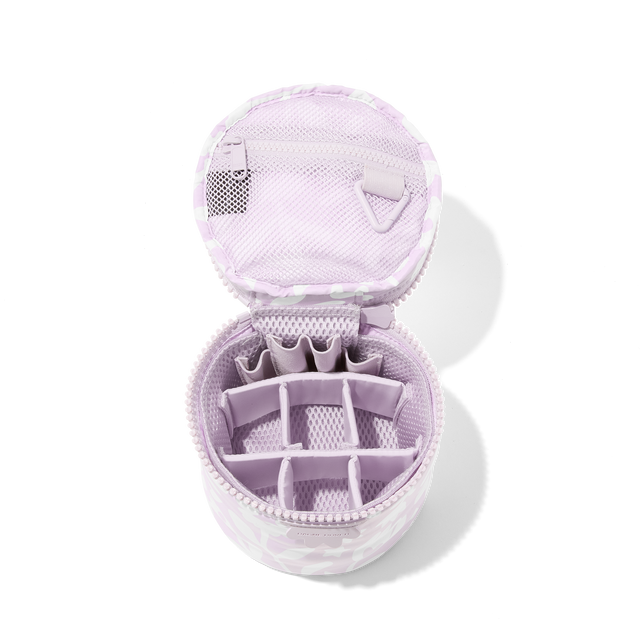 Dagne Dover small Mila Toiletry Pouch in a custom washed lilac and cream floral print unzipped with the 6 adjustable compartments.
