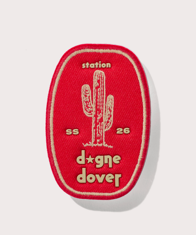 Dagne Dover Station Patch in a fiery, saturated red leaning toward orange.
