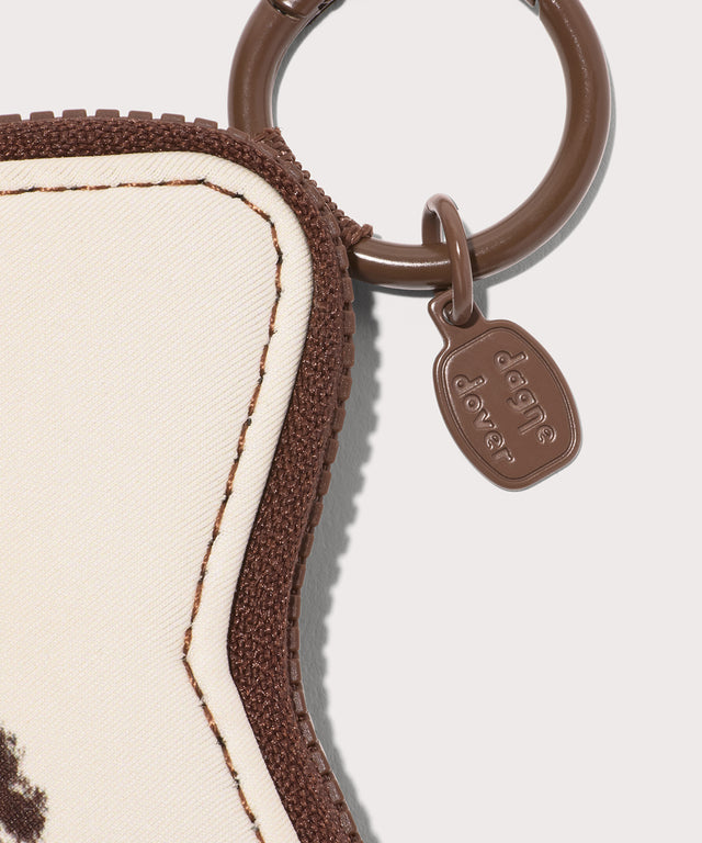 Detail Dagne Dover Star Keychain in a cow print.