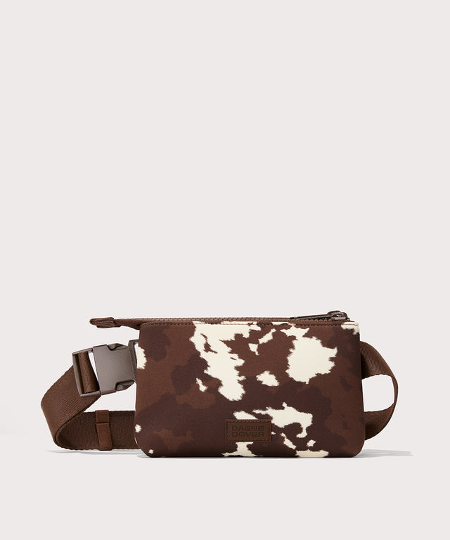 Dagne Dover Bennie Sling in a cow print as seen from the front view.