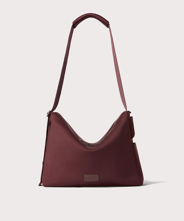 Large Shoulder bag in a deep brown with purple undertones reminiscent of maroon seen from the front view. 
