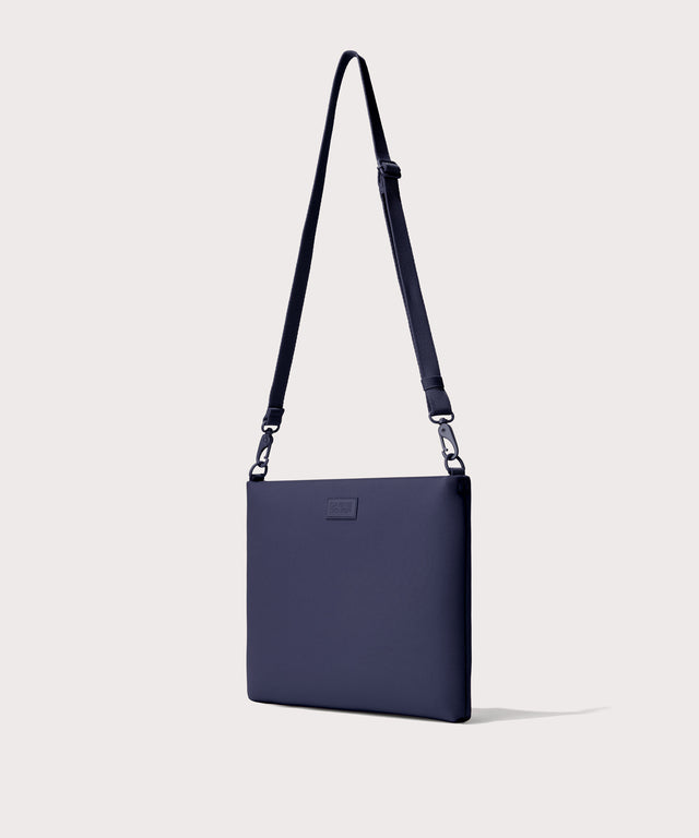 14 inch laptop shoulder bag in navy blue seen from the angle view.