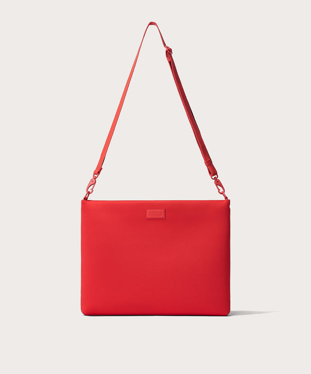 16 inch laptop shoulder bag in a fiery, saturated red leaning toward orange seen from the front view. 
