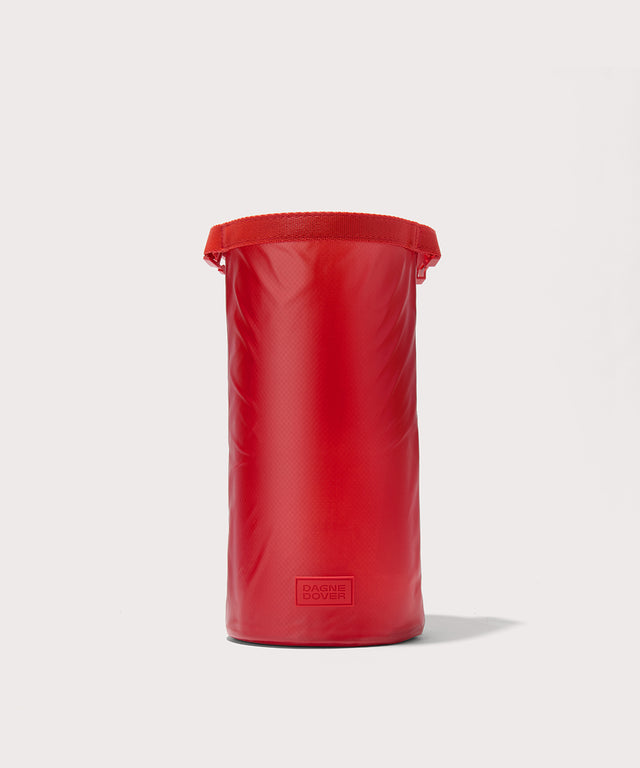 Dagne Dover Rae Roll-Top Dry Bag in a fiery, saturated red leaning toward orange fully unrolled at 11 inches high.
