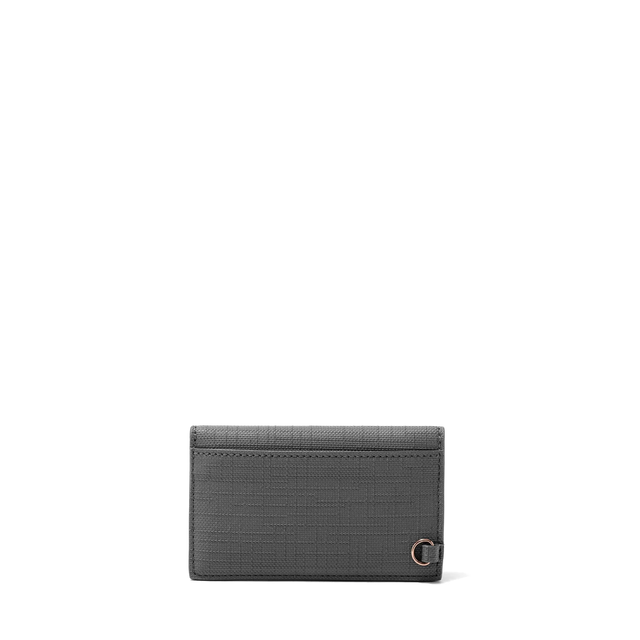 Dagne Dover vegan Card Case in grey seen from the back revealing the one external card slot.