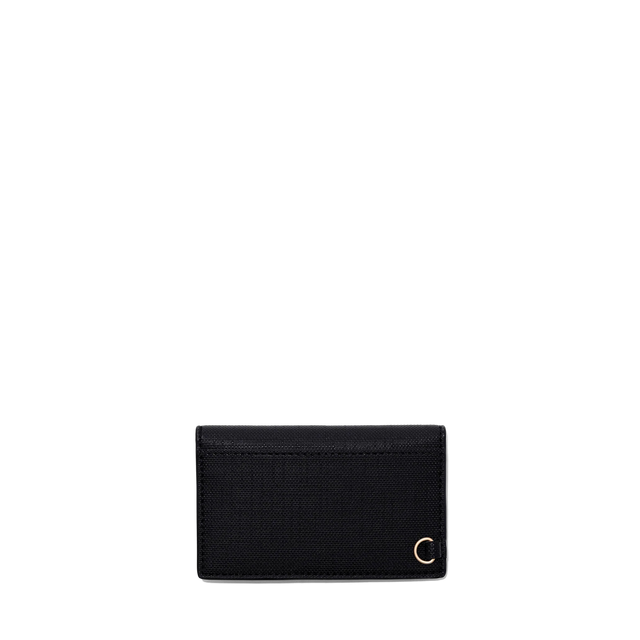 Dagne Dover vegan Card Case in black seen from the back revealing the one external card slot.