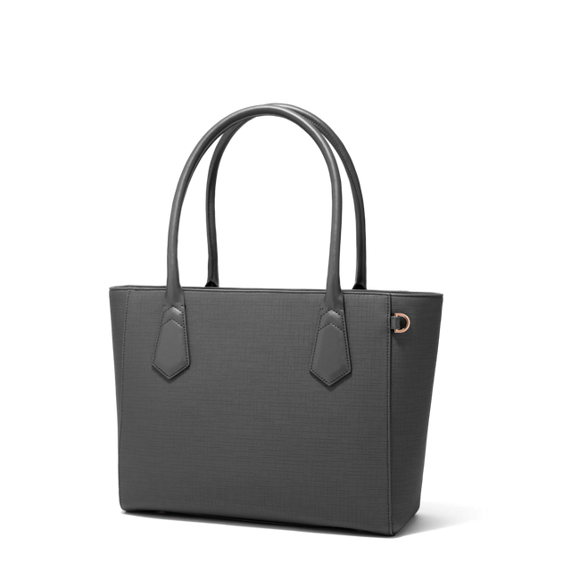 Dagne Dover Classic Signature Leather Tote in grey seen from an angle.