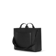 Dagne Dover medium vegan Daily Tote in black seen from an angle.