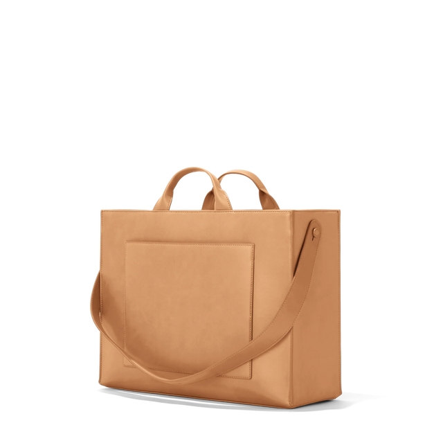 Dagne Dover large vegan Daily Tote in brown seen from an angle.