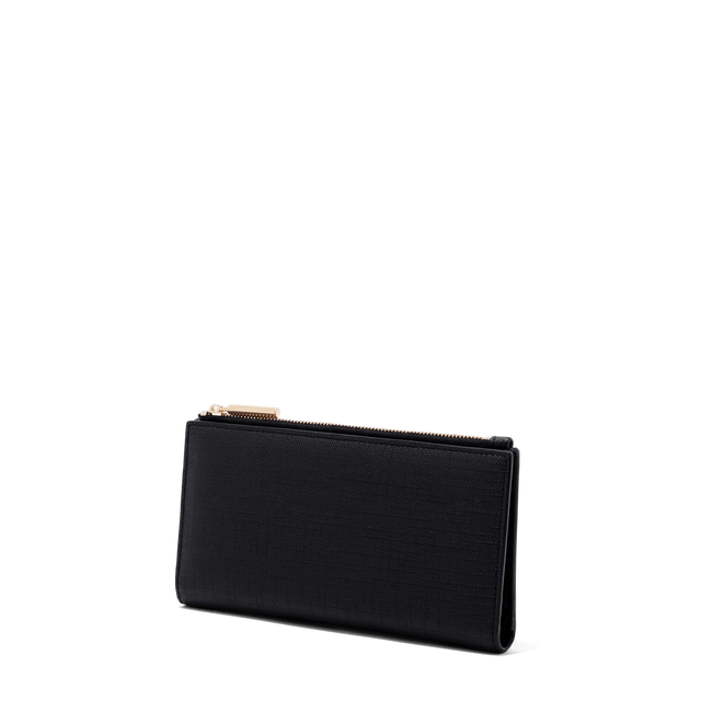 Dagne Dover Slim Wallet in black seen from an angle.