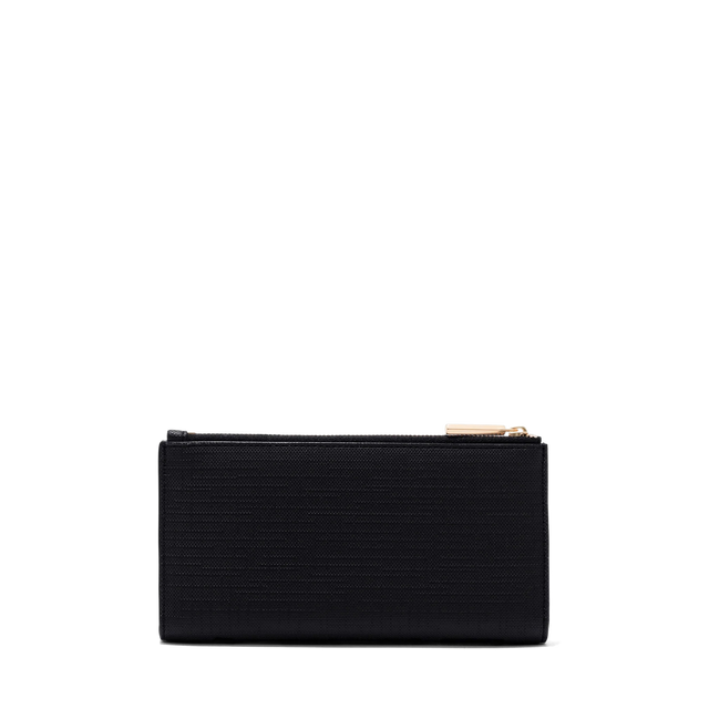 Dagne Dover Slim Wallet in black seen from the back.