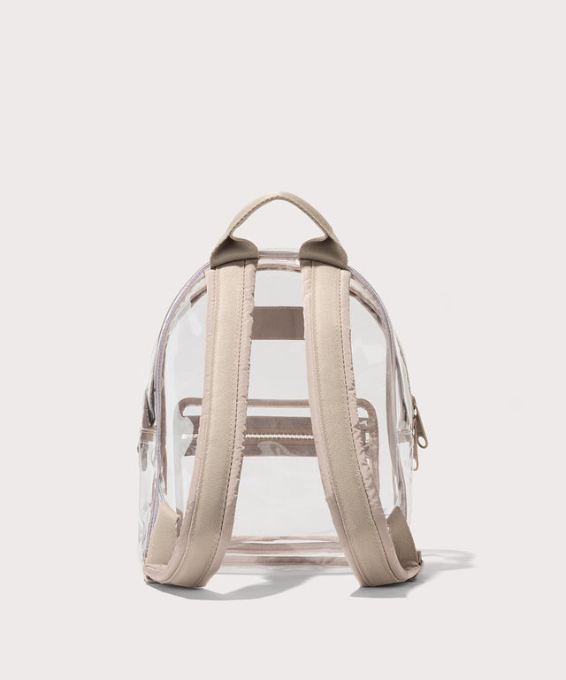 Clear backpack with beige straps on a white background. Stadium compliant. 