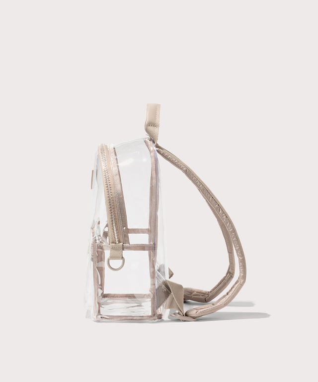 Clear backpack with beige straps, side view on a white background. Stadium compliant. 
