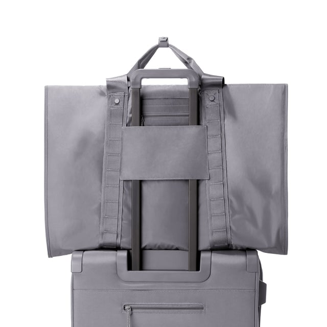 Back view of Capri garment bag in ash on luggage handle