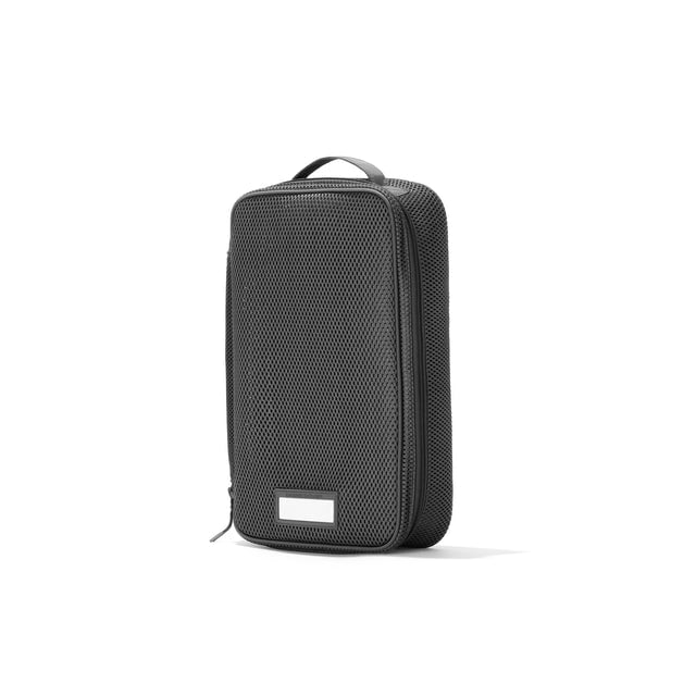 3/4 view of Medium Roma packing cube in carbon grey