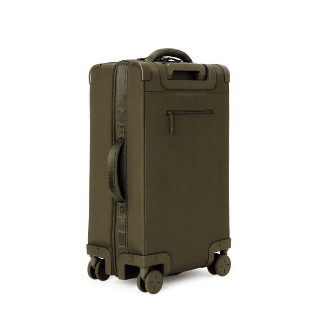3/4 back view of Seattle carry-on rolling luggage 23.5” in dark moss showing side handle and back zippered phone/passport pocket