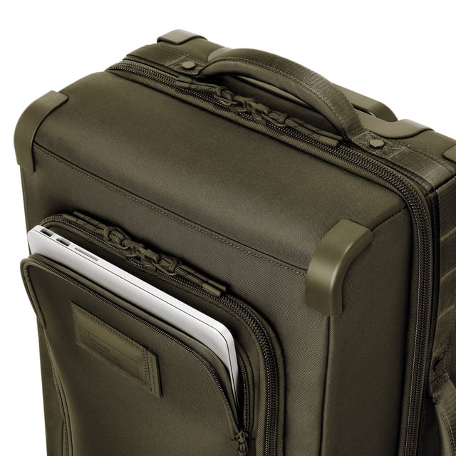 Caption: Front pocket fits most 15” laptops