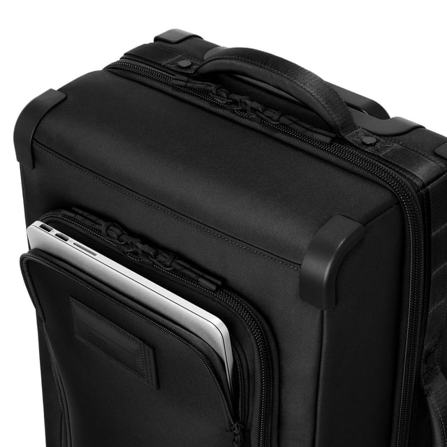 Caption: Front pocket fits most 15” laptops
