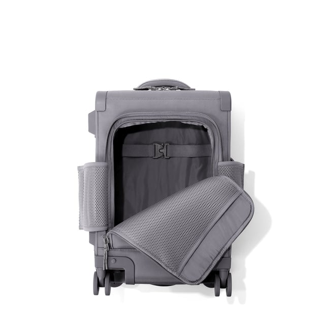 Top down of Seattle carry-on rolling luggage 20.5” in ash with front flap opened. 