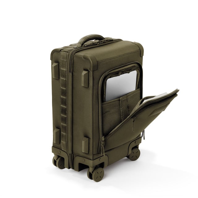 ¾ front view of Seattle carry-on rolling luggage 20.5” in dark moss with front flap opened. Caption: Interior slip pocket fits most 13