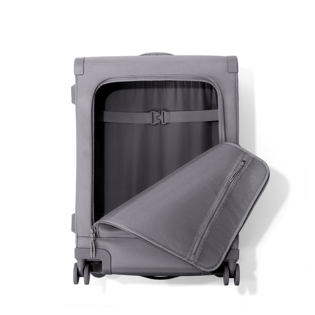 Front view of Sydney checked rolling luggage 25” in ash grey with front flap opened