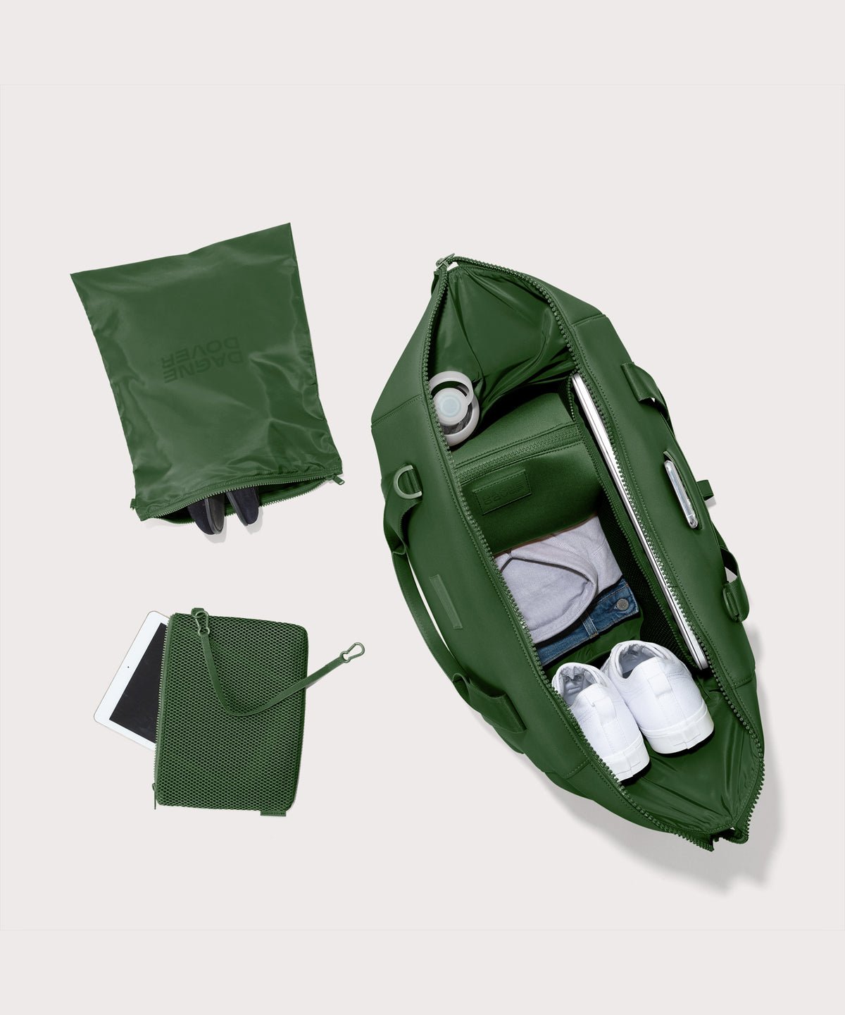 Extra large Landon Carryall in a rich, classic forest green unzipped, top down view. 
