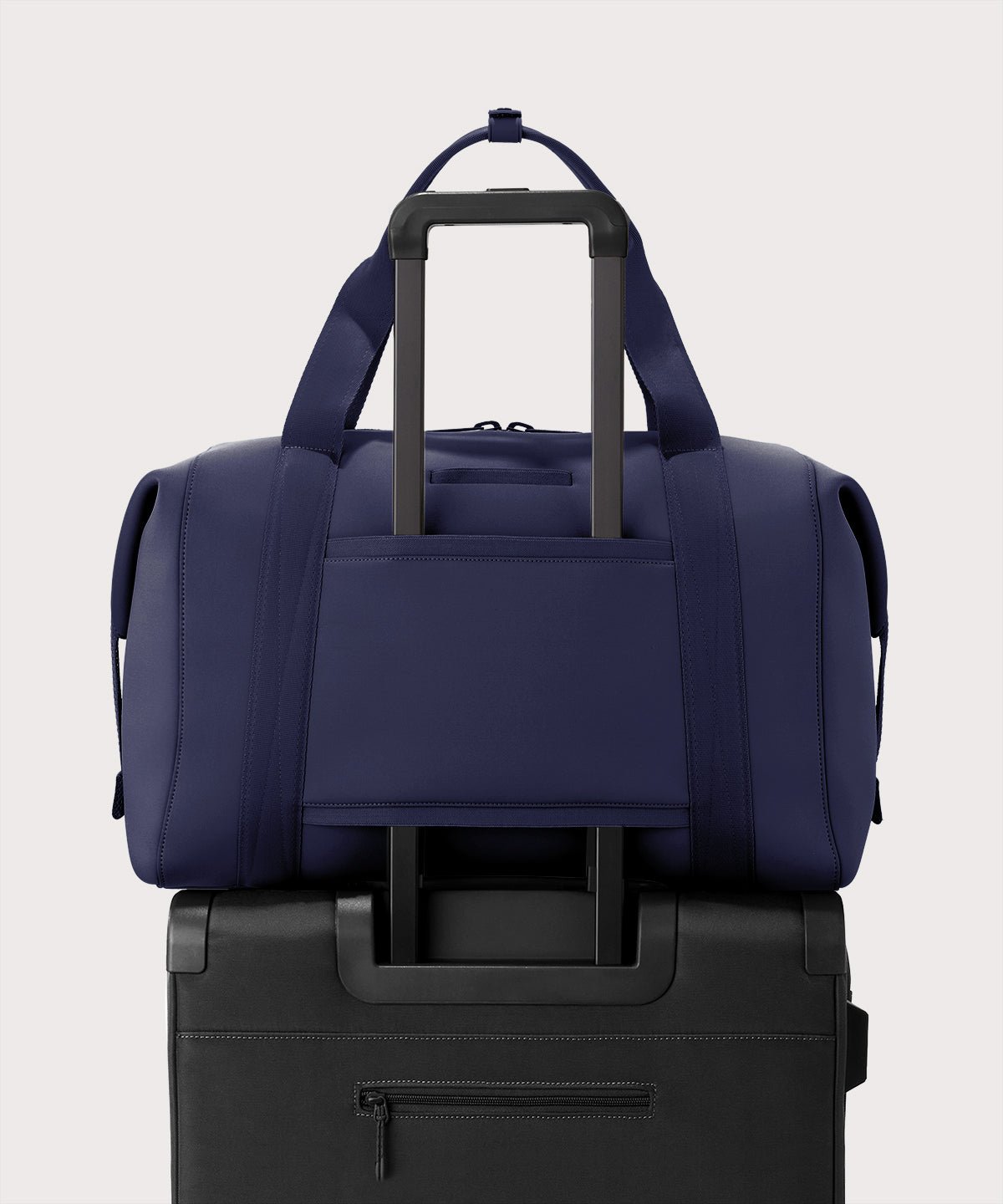 Extra large Landon Carryall in storm displaying luggage sleeve
