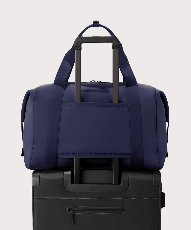 Extra large Landon Carryall in storm displaying luggage sleeve
