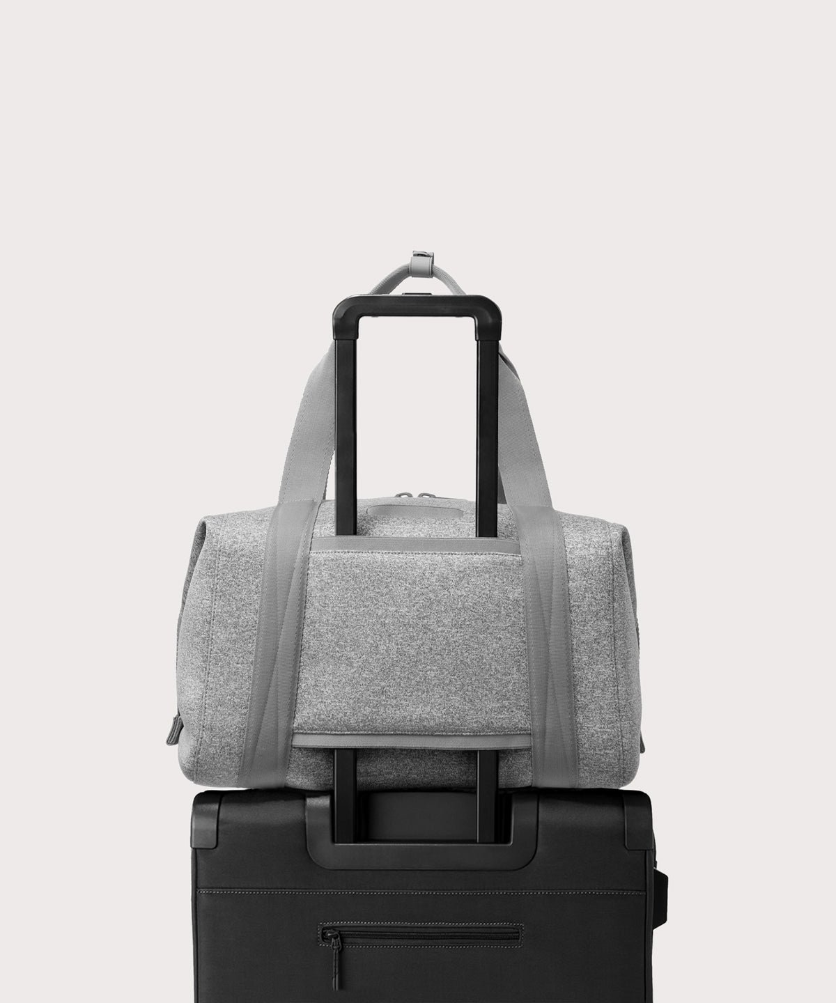 Large Landon Carryall in grey displaying luggage sleeve
