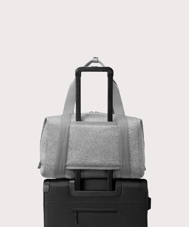 Large Landon Carryall in grey displaying luggage sleeve

