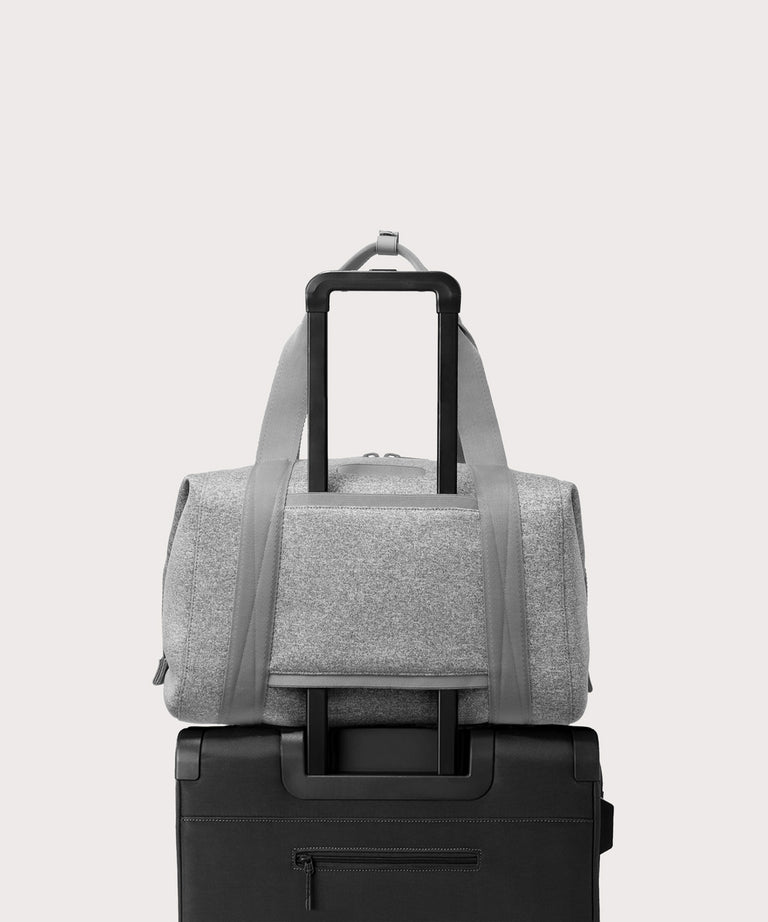 Large Landon Carryall in grey displaying luggage sleeve
