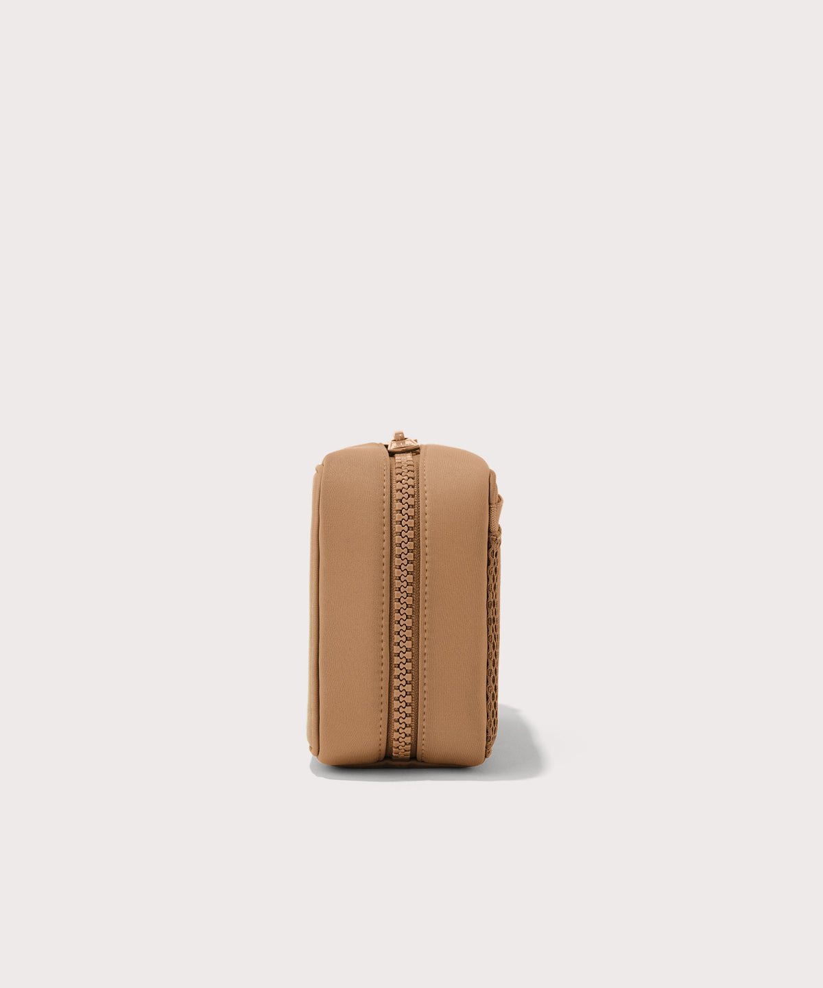 Dagne Dover large Arlo Tech Organizer in camel seen from the side.
