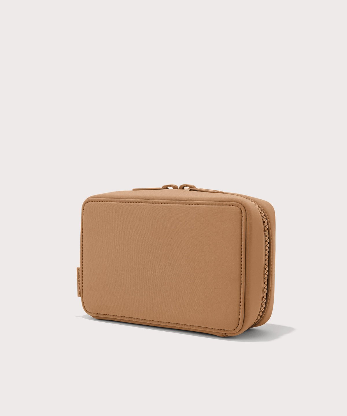 Dagne Dover large Arlo Tech Organizer in camel seen from an angle.
