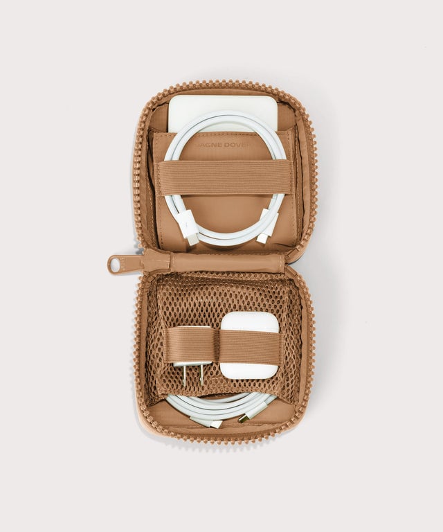 hover - Dagne Dover small Arlo Tech Organizer in camel unzipped, revealing the interior elastic loops and airmesh pockets.