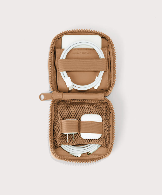 hover - Dagne Dover small Arlo Tech Organizer in camel unzipped, revealing the interior elastic loops and airmesh pockets.