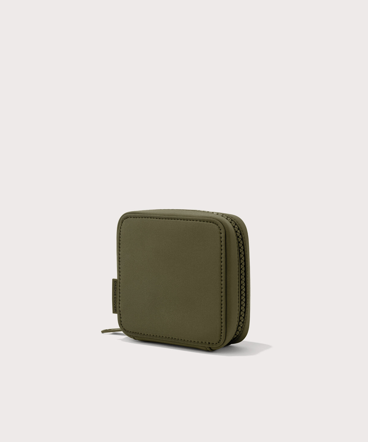 Dagne Dover small Arlo Tech Organizer in dark green seen from an angle.
