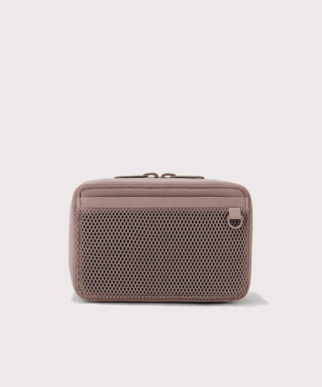 Dagne Dover large Arlo Tech Organizer in pink seen from the back.
